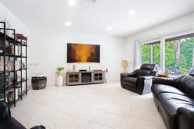 tiled living room with a textured ceiling