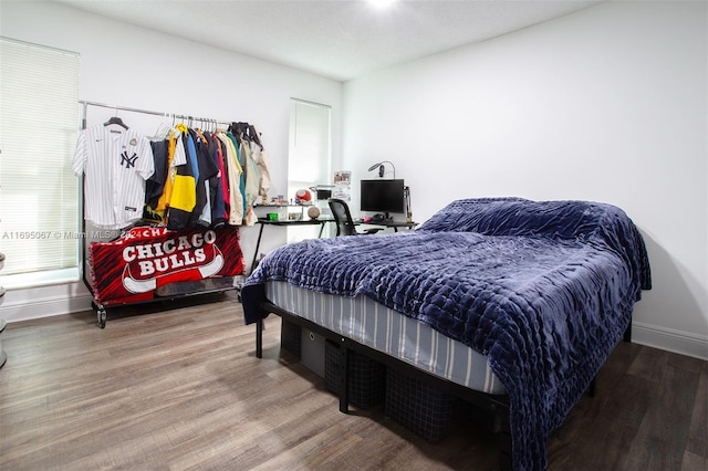 892 NW 83rd Dr, Coral Springs, FL 33071 - bedroom featuring wood finished floors and baseboards