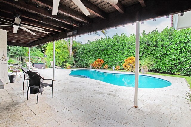 892 NW 83rd Dr, Coral Springs, FL 33071 - view of swimming pool with ceiling fan and a patio