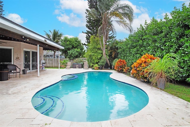 view of swimming pool featuring a patio