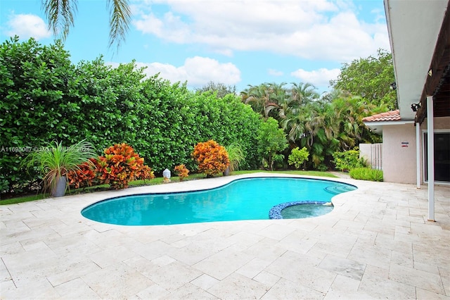 892 NW 83rd Dr, Coral Springs, FL 33071 - view of pool featuring a patio area and a pool with connected hot tub
