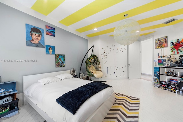 bedroom featuring hardwood / wood-style floors