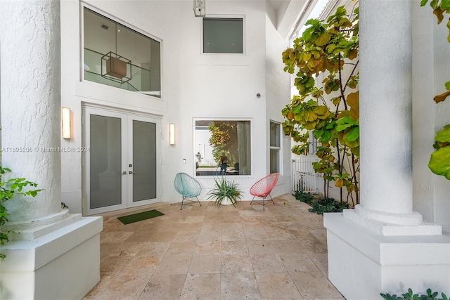 doorway to property with a patio and french doors