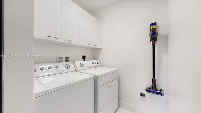 15811 Collins Ave Unit 504, Sunny Isles Beach, FL 33160 - washroom with independent washer and dryer and cabinet space