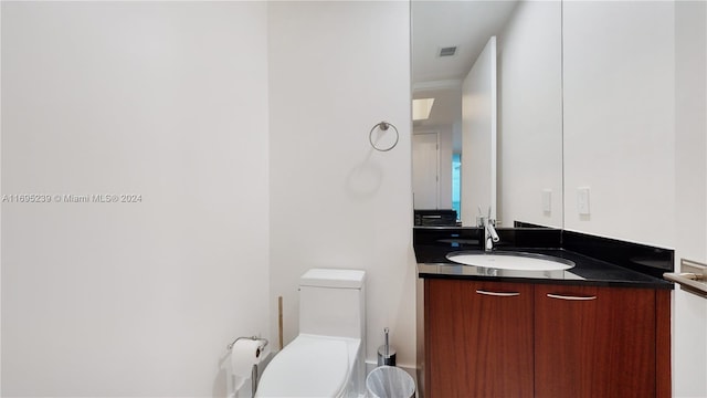 15811 Collins Ave Unit 504, Sunny Isles Beach, FL 33160 - bathroom with vanity and toilet