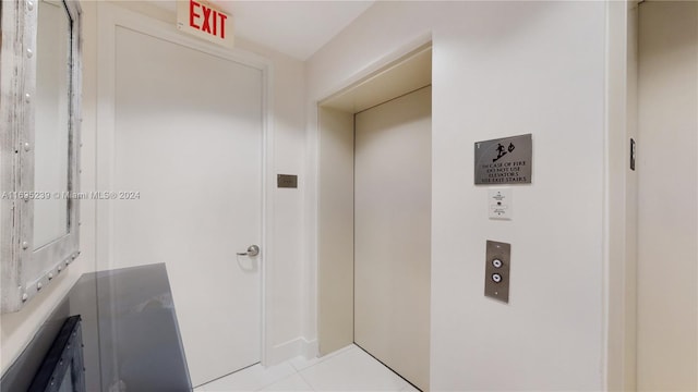 interior space featuring light tile patterned flooring