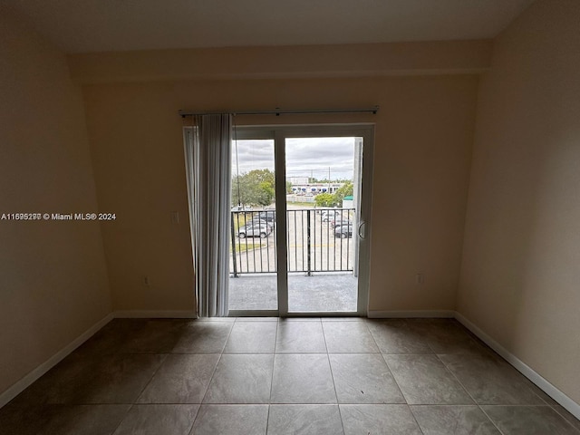 view of tiled spare room