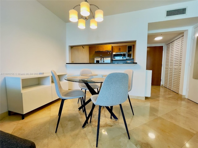 dining room with a chandelier