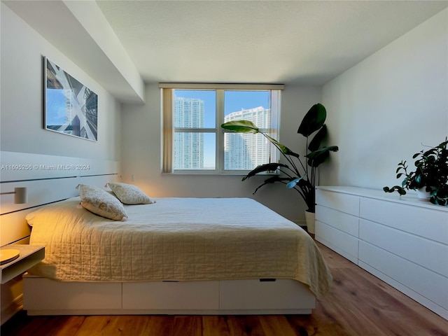 bedroom featuring hardwood / wood-style flooring