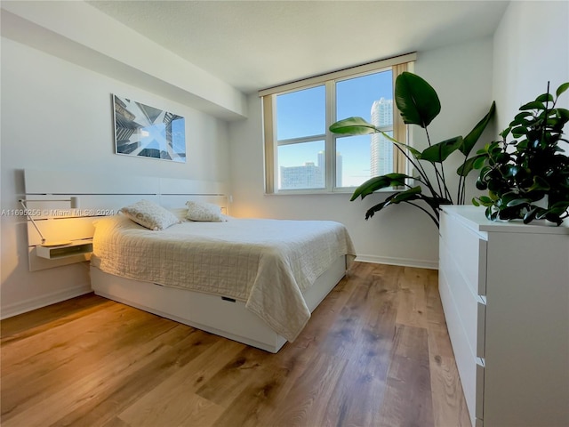 bedroom featuring light hardwood / wood-style floors