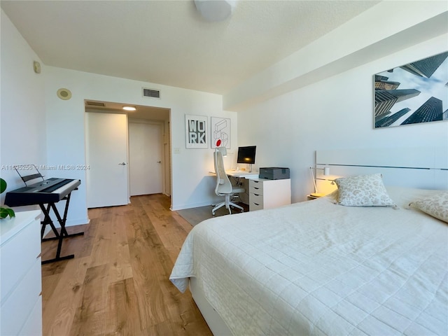 bedroom featuring light hardwood / wood-style flooring