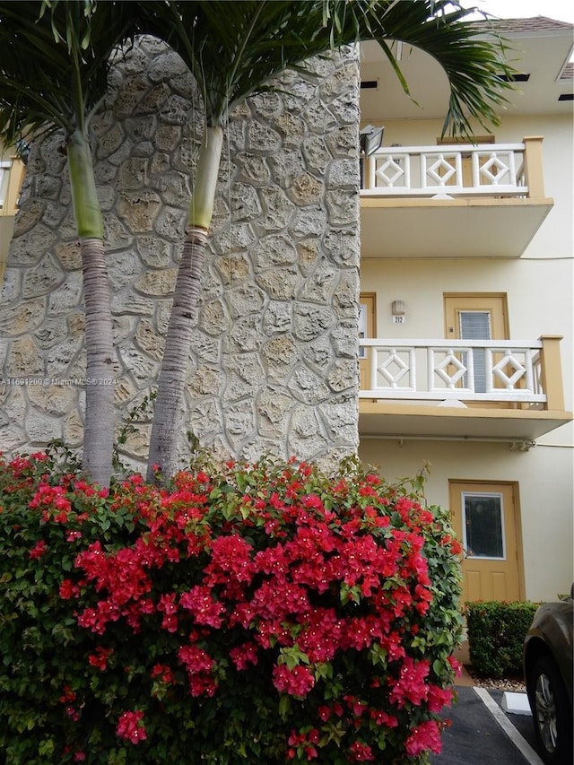 5051 W Oakland Park Blvd Unit 302, Lauderdale Lakes, FL 33313 - view of property featuring uncovered parking