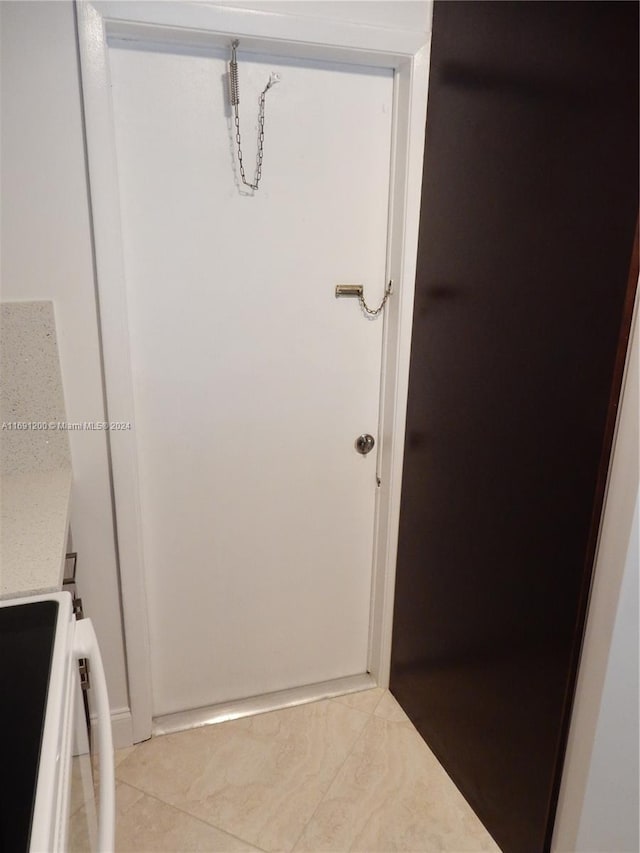 bathroom with tile patterned flooring