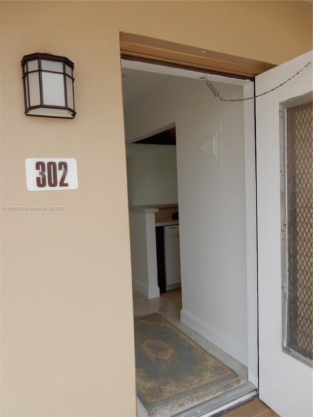 5051 W Oakland Park Blvd Unit 302, Lauderdale Lakes, FL 33313 - corridor featuring tile patterned floors