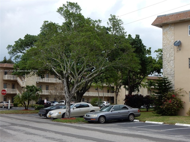 5051 W Oakland Park Blvd Unit 302, Lauderdale Lakes, FL 33313 - view of uncovered parking lot