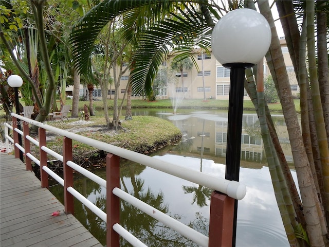 view of dock with a water view