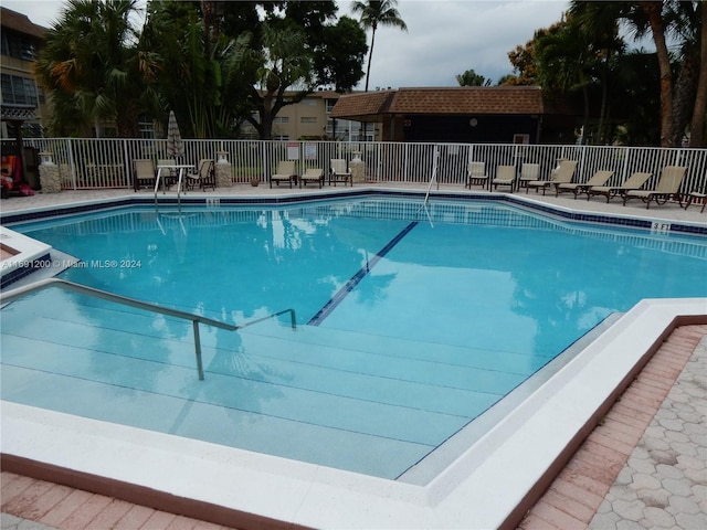 5051 W Oakland Park Blvd Unit 302, Lauderdale Lakes, FL 33313 - community pool with fence