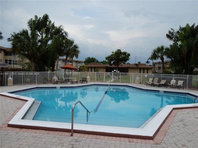 5051 W Oakland Park Blvd Unit 302, Lauderdale Lakes, FL 33313 - community pool with fence