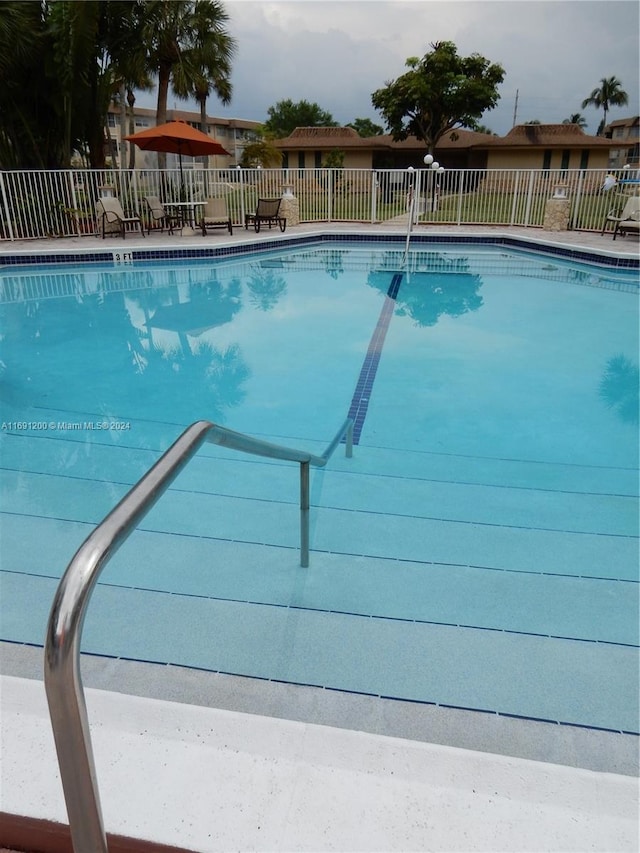 5051 W Oakland Park Blvd Unit 302, Lauderdale Lakes, FL 33313 - community pool with fence