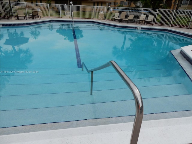 5051 W Oakland Park Blvd Unit 302, Lauderdale Lakes, FL 33313 - community pool with fence
