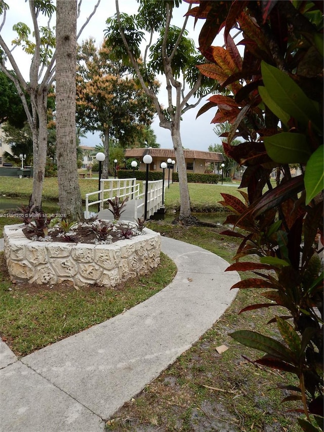 5051 W Oakland Park Blvd Unit 302, Lauderdale Lakes, FL 33313 - view of grassy yard