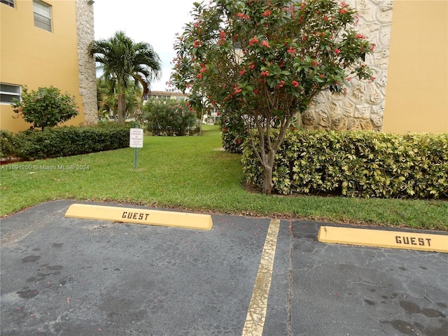 5051 W Oakland Park Blvd Unit 302, Lauderdale Lakes, FL 33313 - view of uncovered parking lot