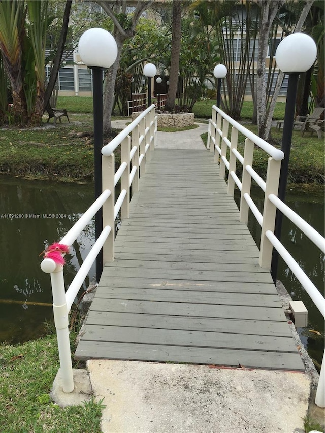 view of dock with a water view