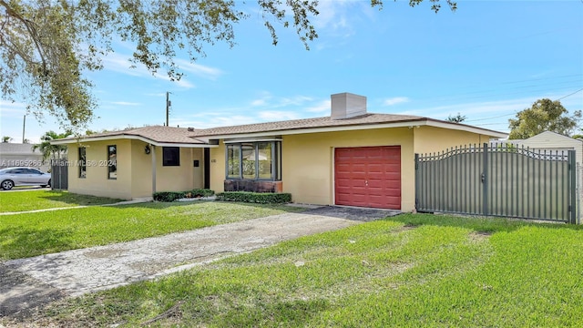 ranch-style home with a garage and a front yard