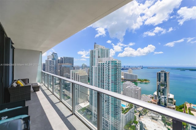 balcony featuring a water view