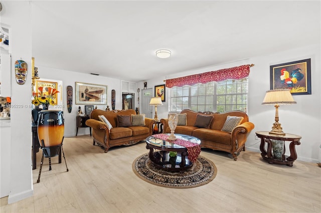 living room with light hardwood / wood-style floors