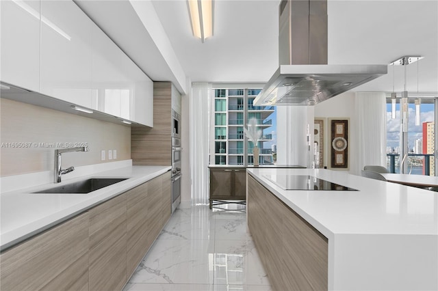 kitchen with marble finish floor, island exhaust hood, black electric stovetop, a sink, and modern cabinets