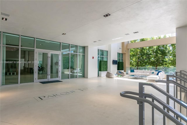 view of patio featuring french doors and fence