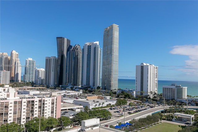 property's view of city with a water view