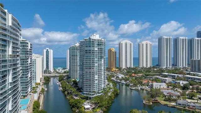 property's view of city featuring a water view