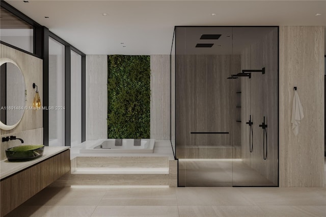 bathroom featuring vanity, tile patterned flooring, and plus walk in shower