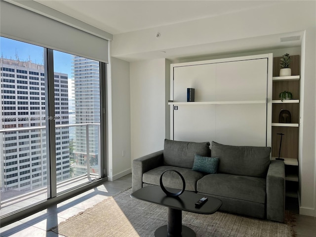 living room featuring a wealth of natural light