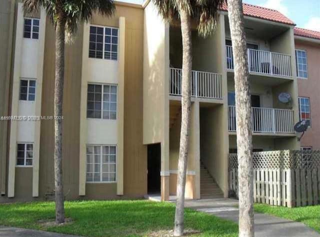 5201 Geneva Way Unit 301, Doral, FL 33166 - view of apartment building / complex featuring stairway