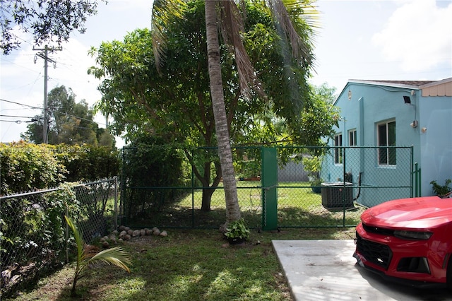 view of yard featuring central AC unit