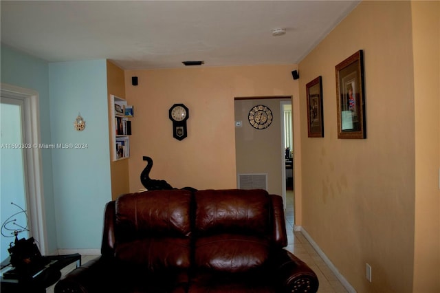 living room with light tile patterned floors