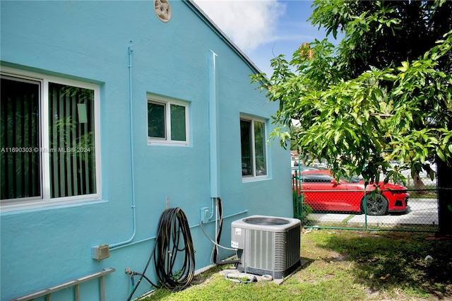 view of side of property featuring cooling unit