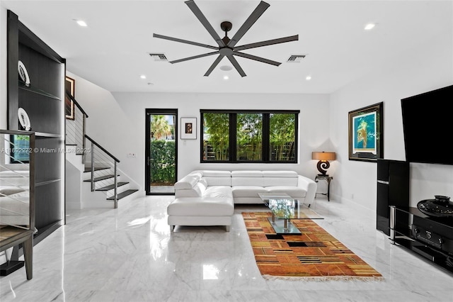 living room with marble finish floor, stairway, visible vents, and recessed lighting