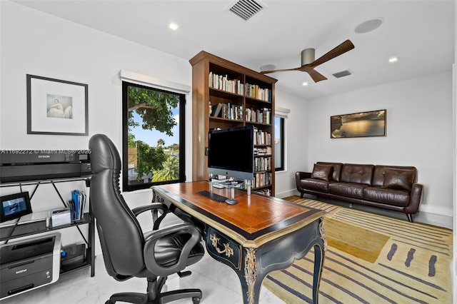 office space with baseboards, visible vents, a ceiling fan, and recessed lighting