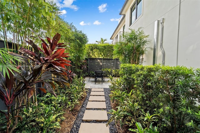 view of yard featuring a patio area and fence