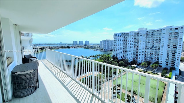 balcony featuring a water view