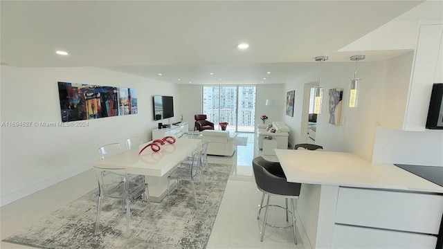 dining space with light tile patterned flooring