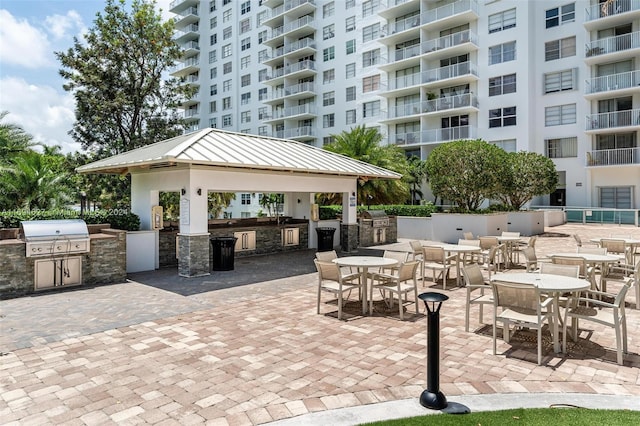 view of patio featuring a gazebo and area for grilling