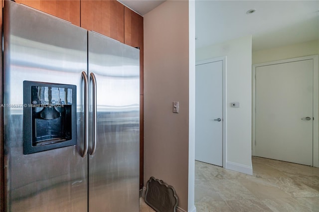 kitchen with stainless steel refrigerator with ice dispenser