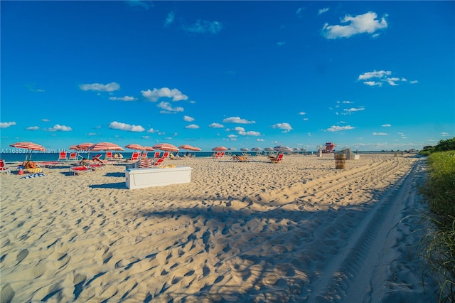 view of water feature with a beach view