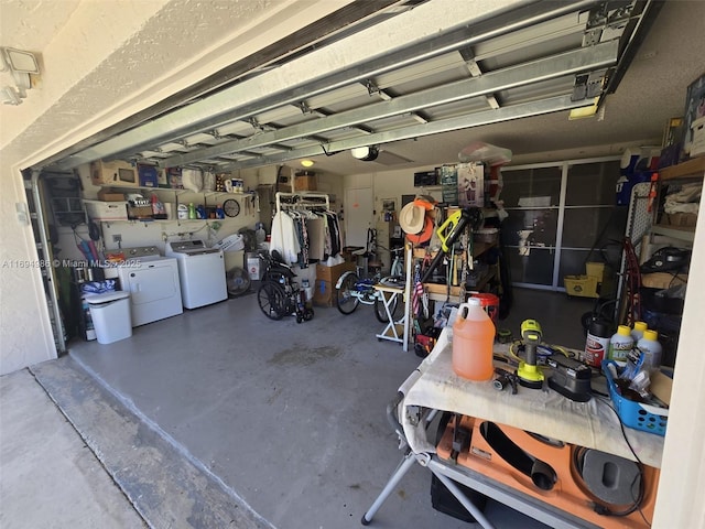 garage with washer and clothes dryer