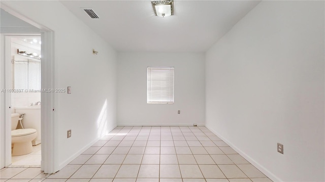 view of tiled empty room